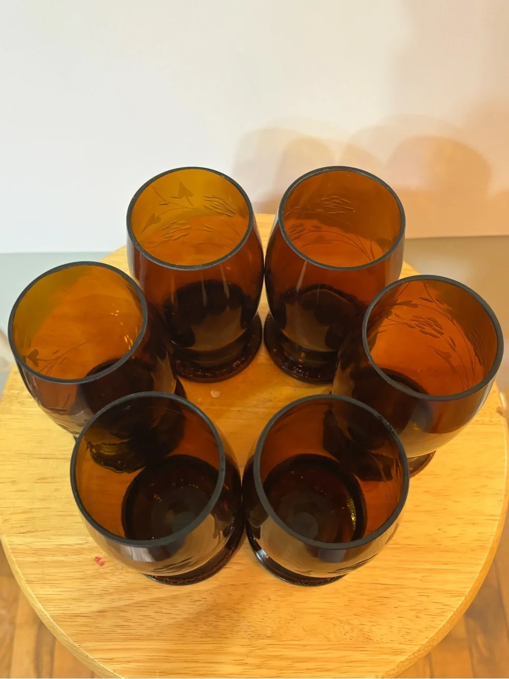 A set of six upcycled vintage amber beer bottle drinking glasses